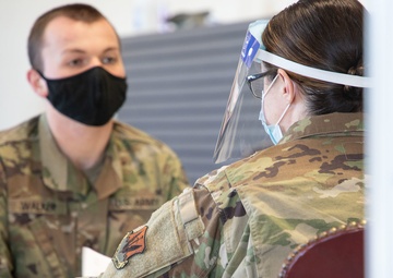 Massachusetts military forces join together to administer vaccine