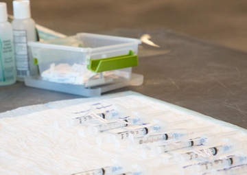 Massachusetts military forces join together to administer vaccine
