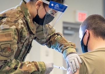 Massachusetts military forces join together to administer vaccine