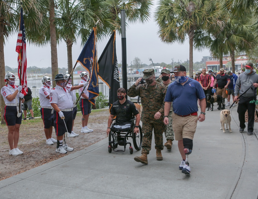 Veterans, service dogs, stroll in the park to raise awareness