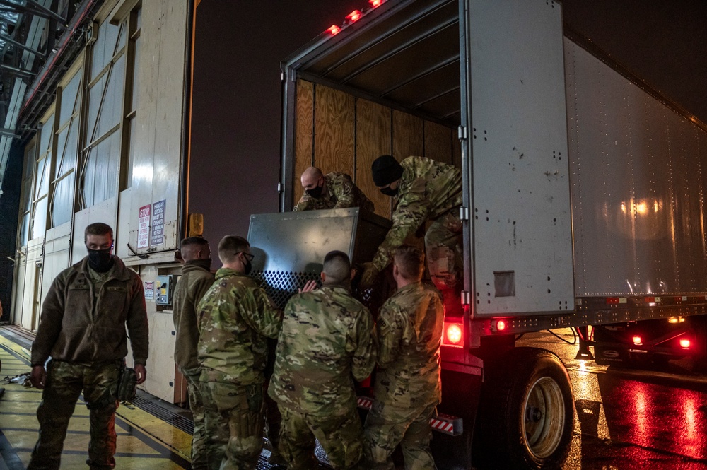 North Dakota National Guard 816th Military Police Company moving equipment