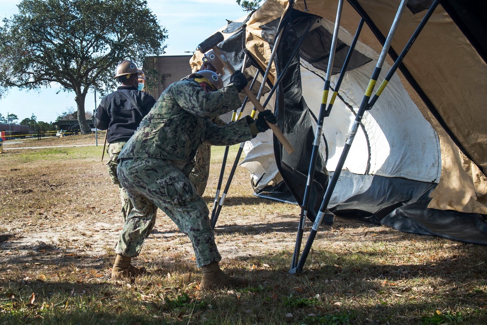 NMCB 1 COVID Vaccine Administration Camp Concept