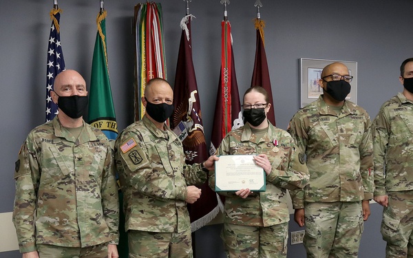 CMD teams stand with Sfc. Lord