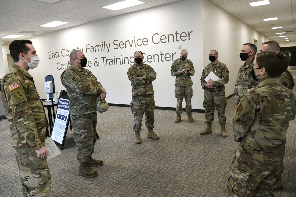 Oregon Adjutant General Tours 211info center, meets with service members and staff