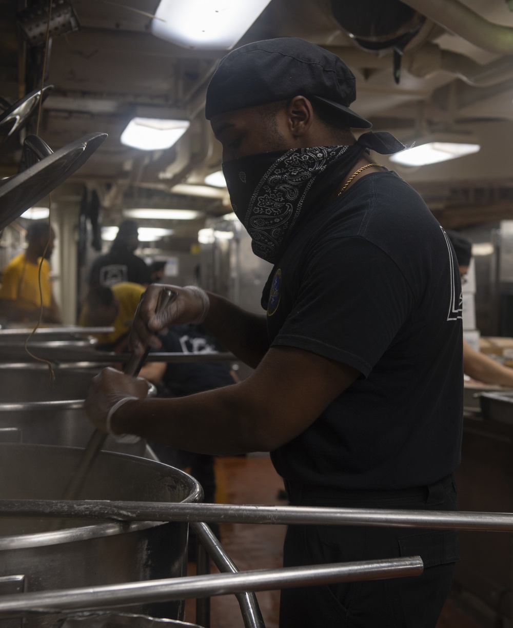 Sailors Aboard USS Nimitz Prepare Food for Sailors