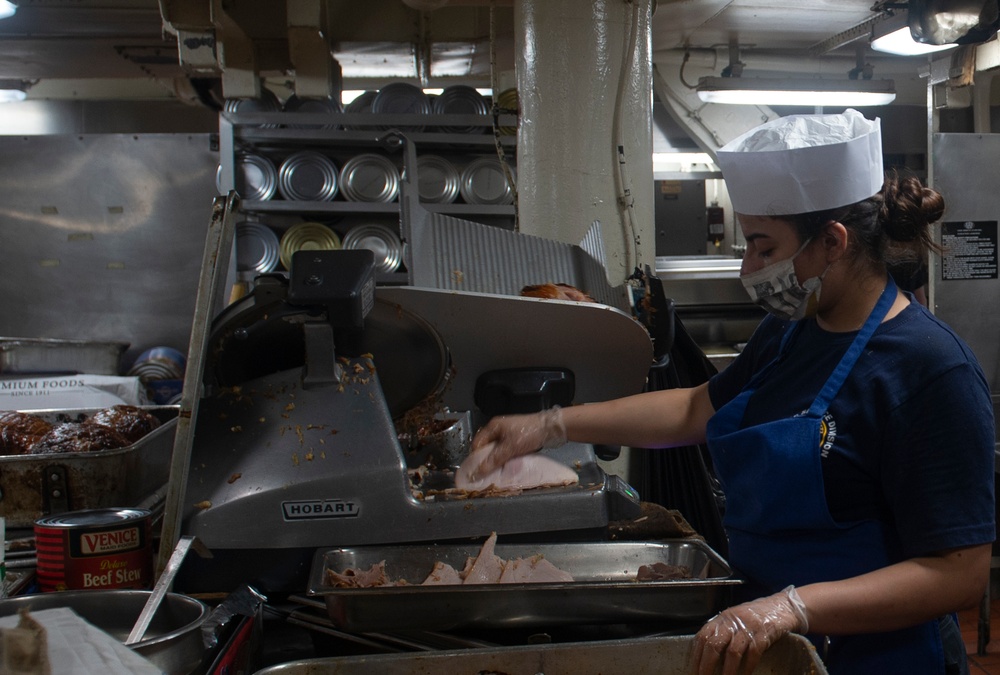 Sailors Aboard USS Nimitz Prepare Food for Sailors