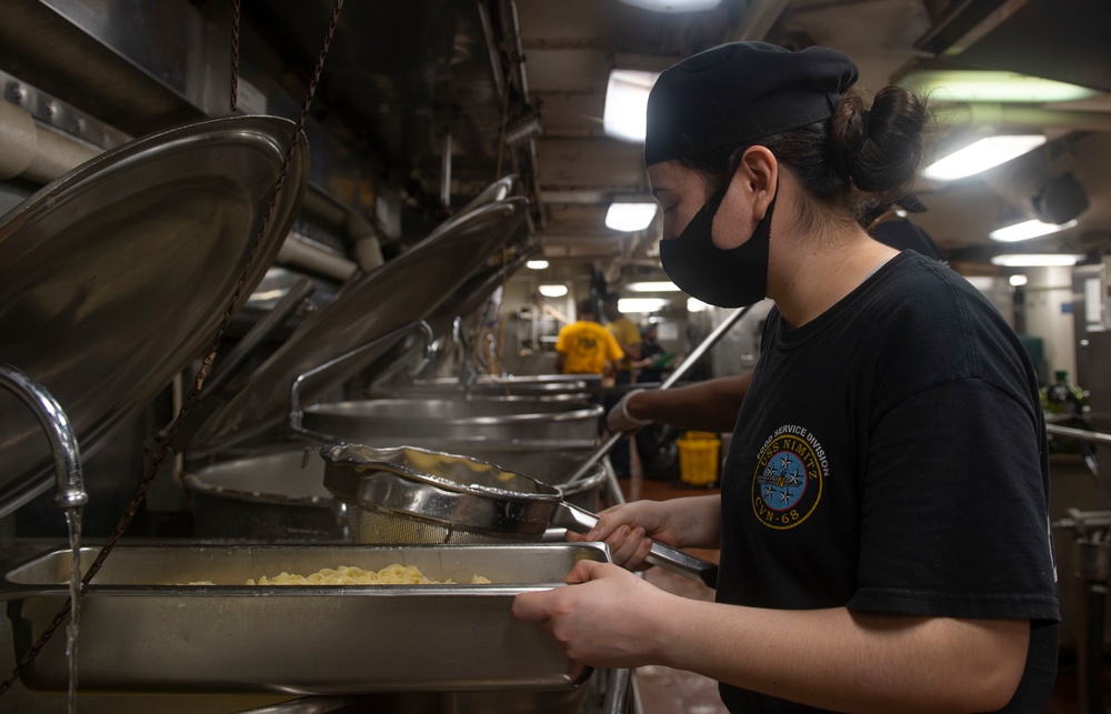 Sailors Aboard USS Nimitz Prepare Food for Sailors