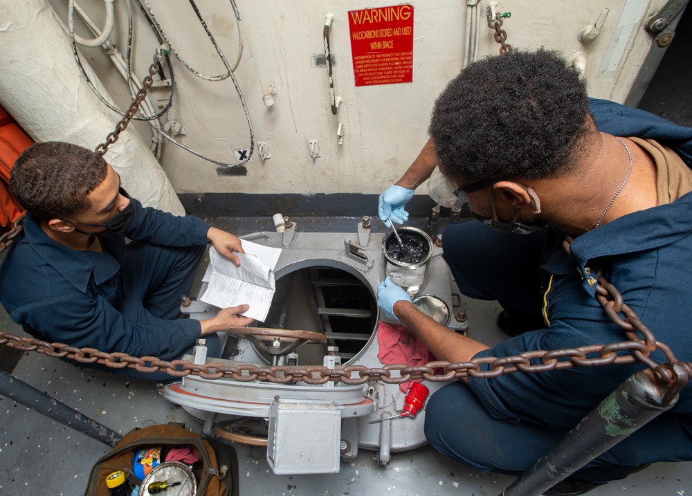 Sailors Perform Scuttle Maintenance