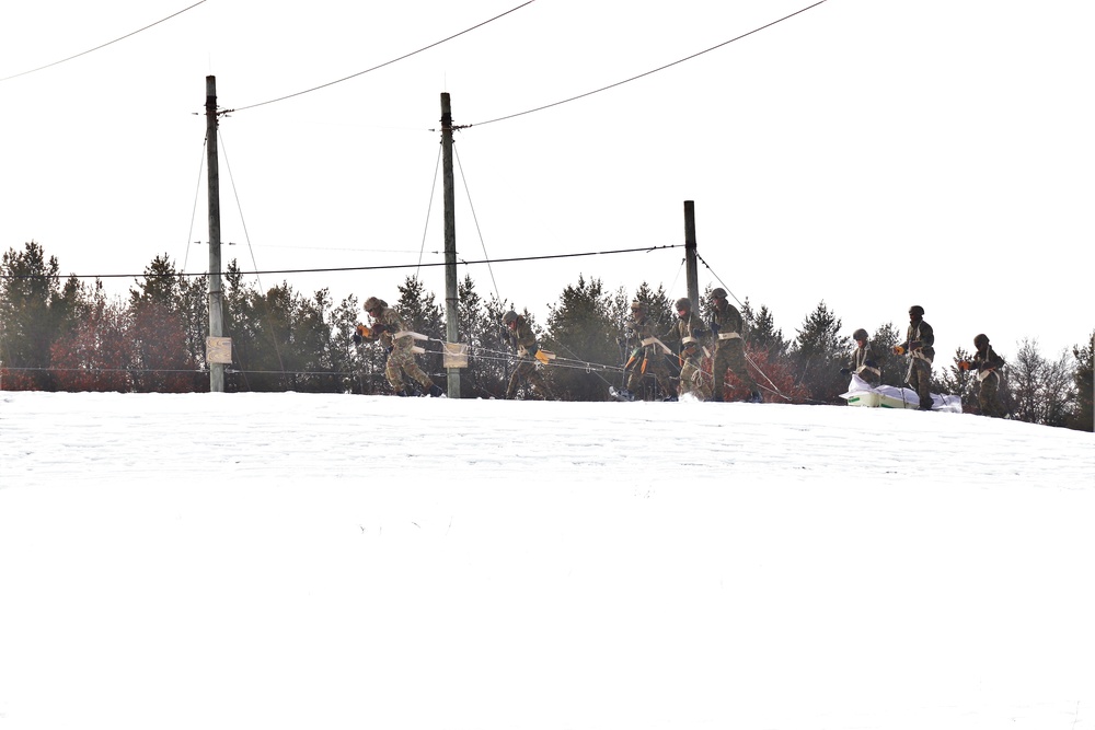 Fort McCoy CWOC class 21-03 students train using snowshoes, ahkio sleds