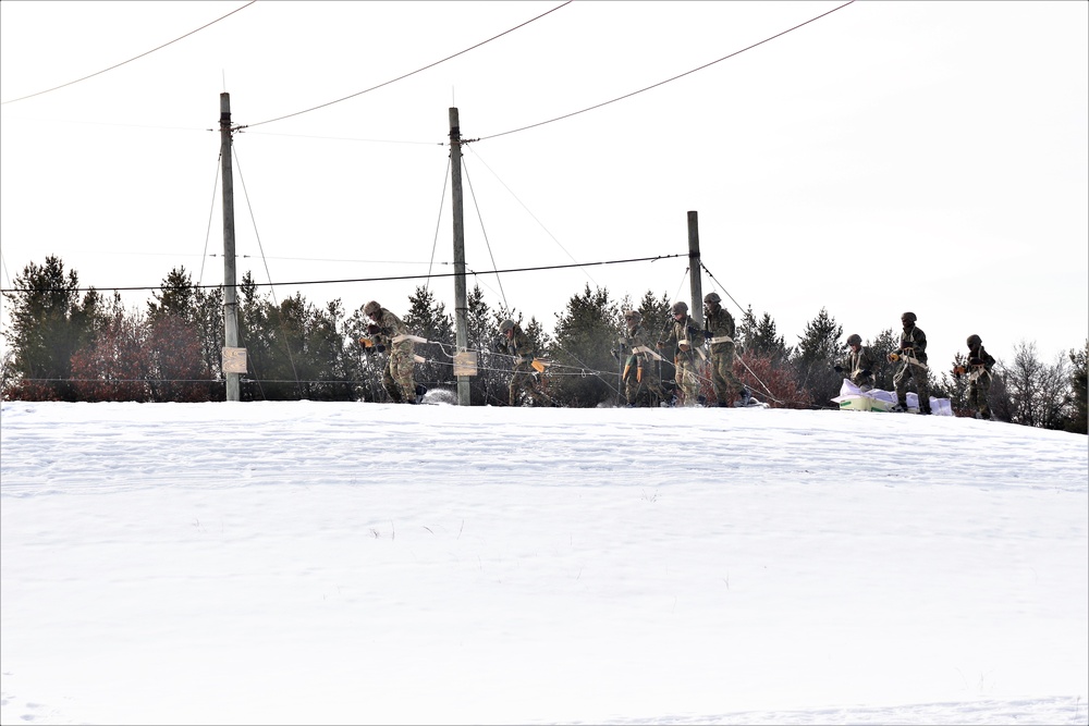 Fort McCoy CWOC class 21-03 students train using snowshoes, ahkio sleds