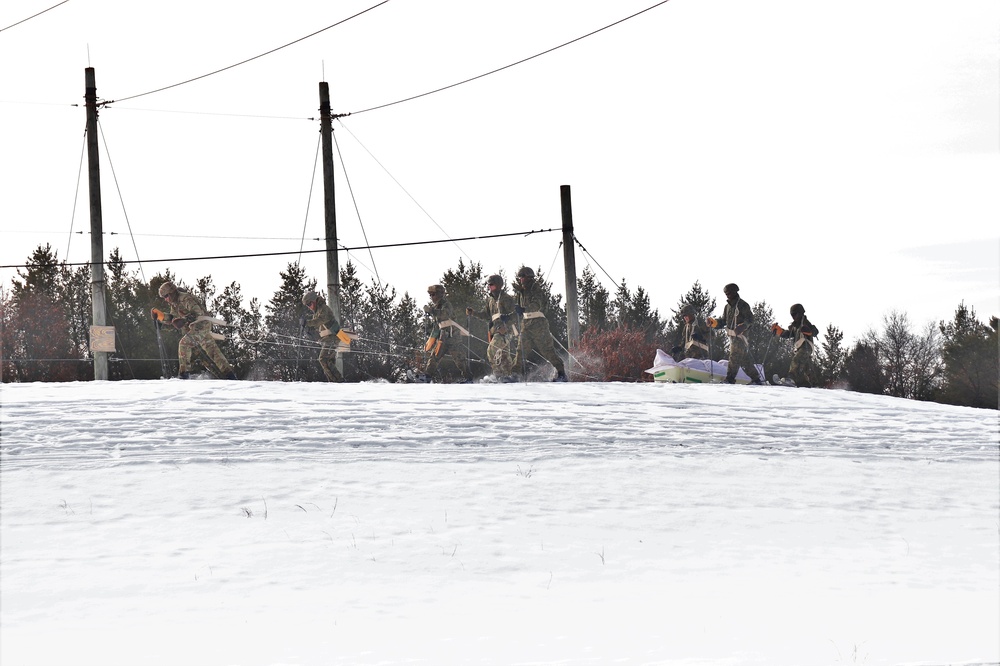 Fort McCoy CWOC class 21-03 students train using snowshoes, ahkio sleds