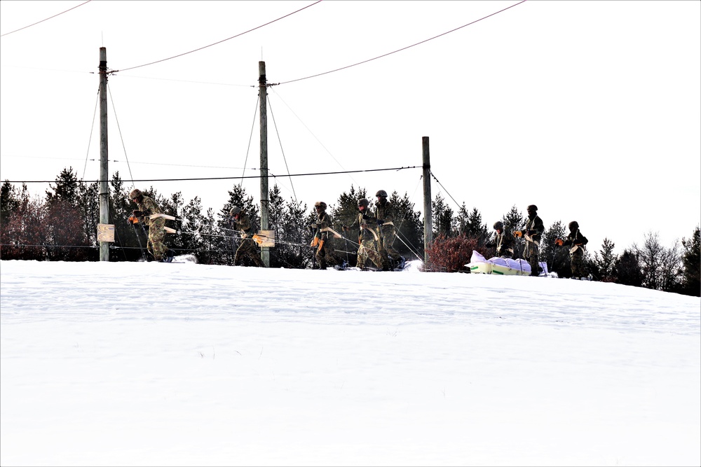 Fort McCoy CWOC class 21-03 students train using snowshoes, ahkio sleds