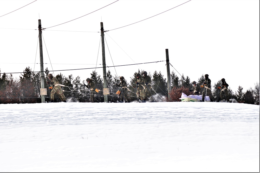 Fort McCoy CWOC class 21-03 students train using snowshoes, ahkio sleds