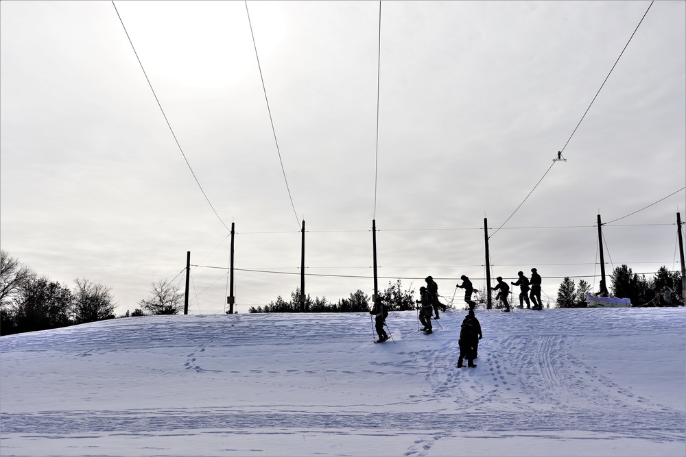 Fort McCoy CWOC class 21-03 students train using snowshoes, ahkio sleds