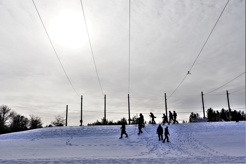 Fort McCoy CWOC class 21-03 students train using snowshoes, ahkio sleds