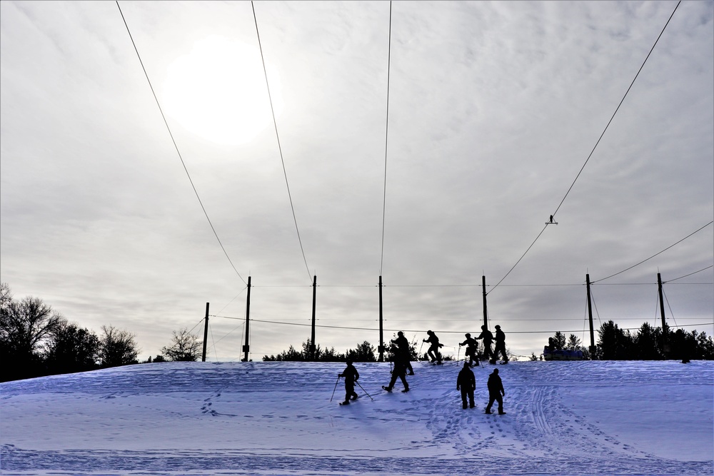 Fort McCoy CWOC class 21-03 students train using snowshoes, ahkio sleds