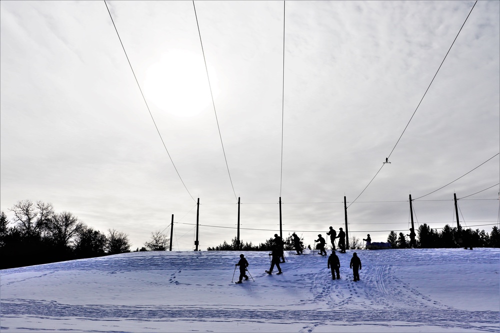 Fort McCoy CWOC class 21-03 students train using snowshoes, ahkio sleds