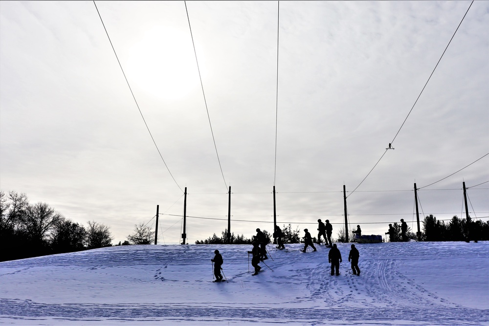 Fort McCoy CWOC class 21-03 students train using snowshoes, ahkio sleds