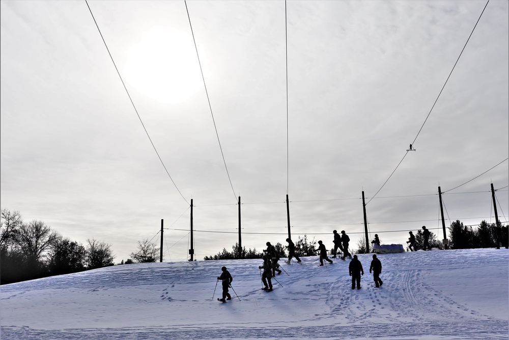 Fort McCoy CWOC class 21-03 students train using snowshoes, ahkio sleds