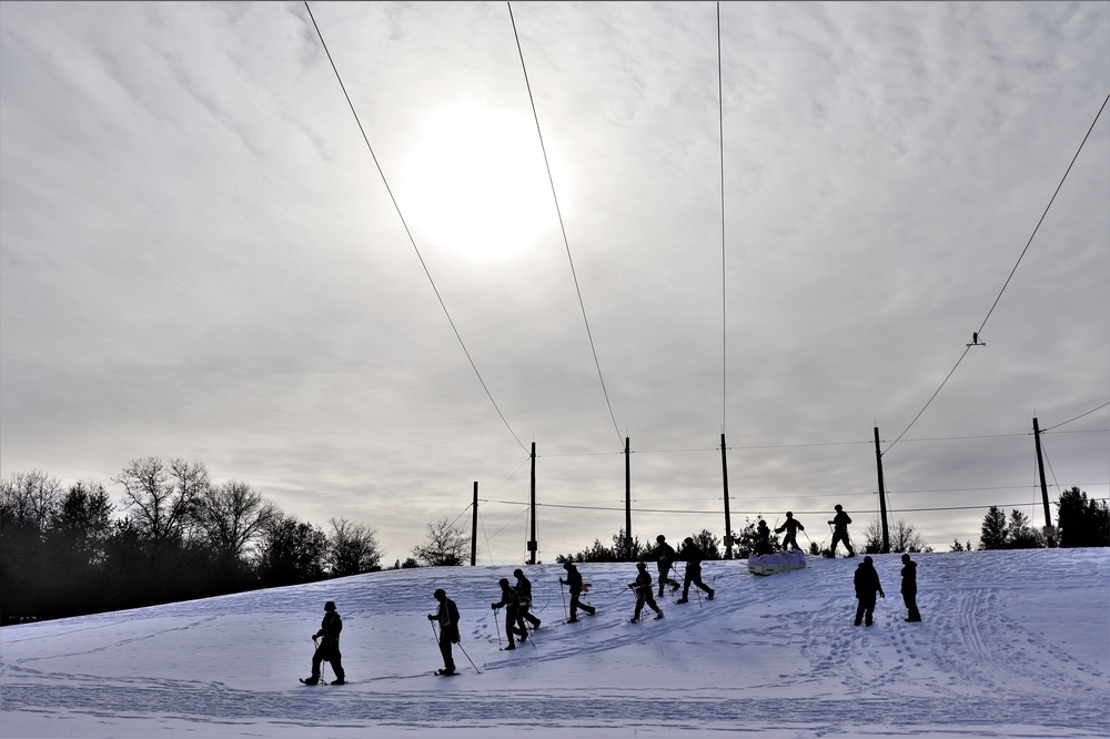 Fort McCoy CWOC class 21-03 students train using snowshoes, ahkio sleds