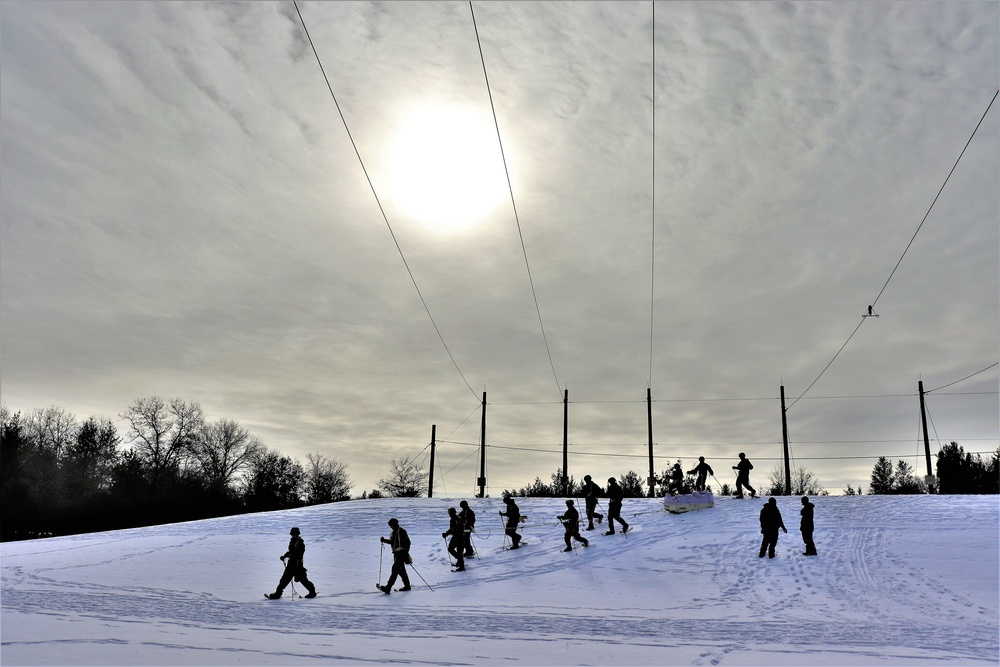 Fort McCoy CWOC class 21-03 students train using snowshoes, ahkio sleds