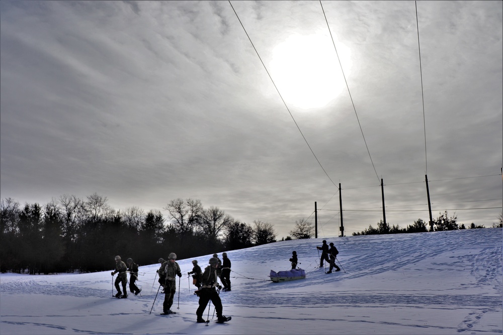 Fort McCoy CWOC class 21-03 students train using snowshoes, ahkio sleds