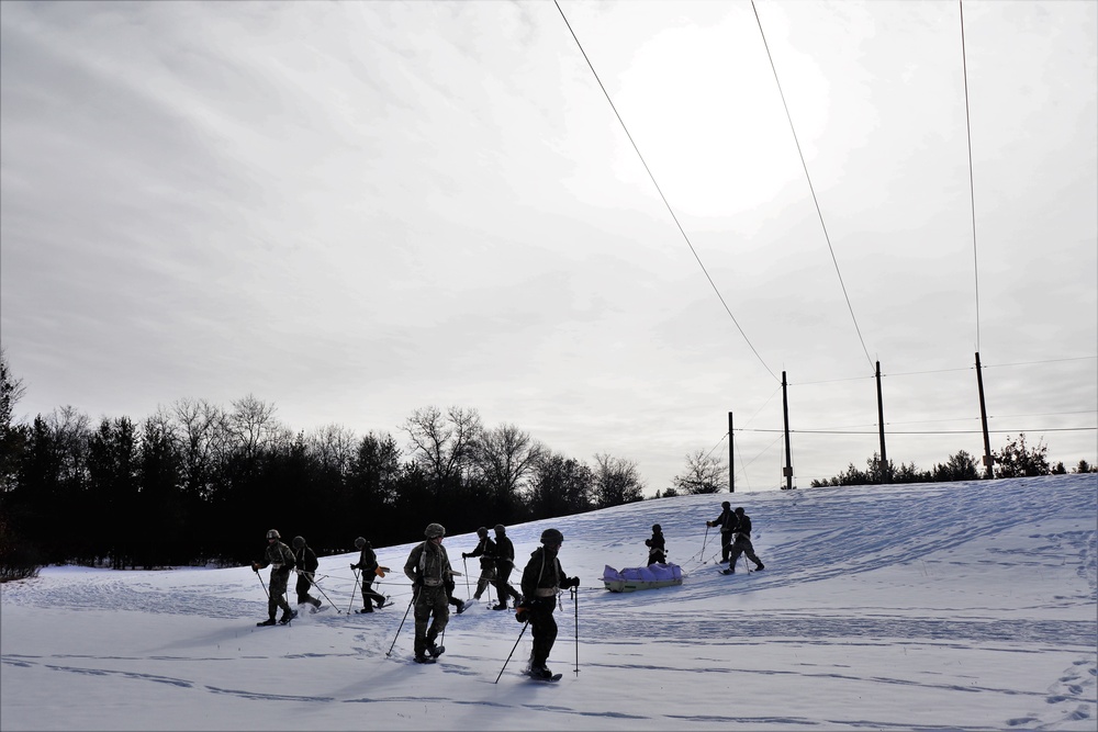 Fort McCoy CWOC class 21-03 students train using snowshoes, ahkio sleds