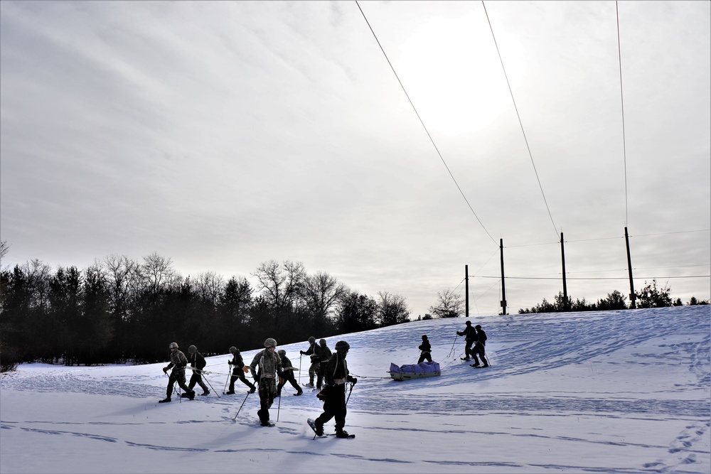 Fort McCoy CWOC class 21-03 students train using snowshoes, ahkio sleds