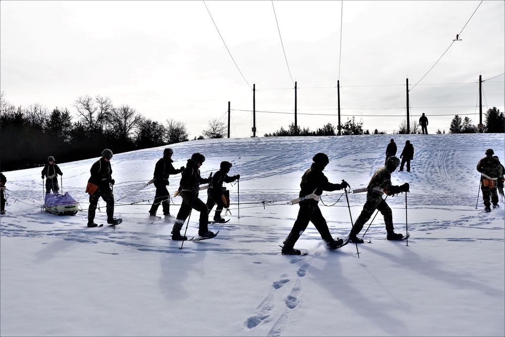 Fort McCoy CWOC class 21-03 students train using snowshoes, ahkio sleds