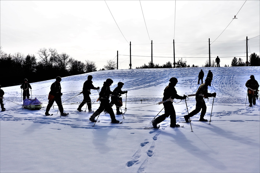 Fort McCoy CWOC class 21-03 students train using snowshoes, ahkio sleds