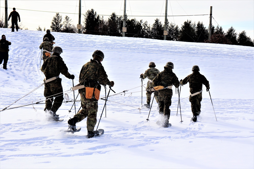 Fort McCoy CWOC class 21-03 students train using snowshoes, ahkio sleds