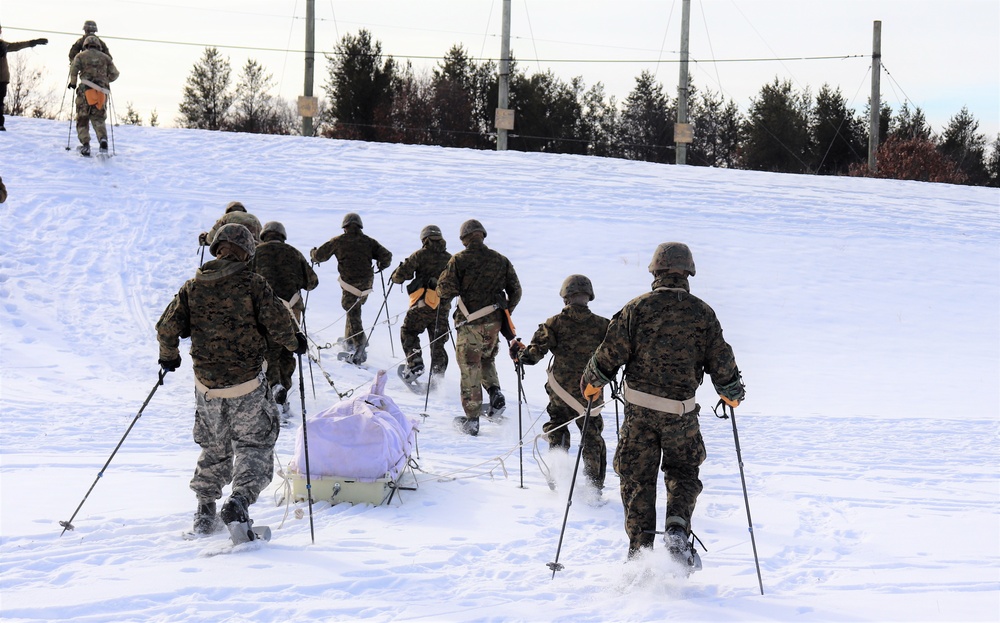 Fort McCoy CWOC class 21-03 students train using snowshoes, ahkio sleds