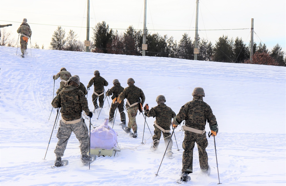 Fort McCoy CWOC class 21-03 students train using snowshoes, ahkio sleds