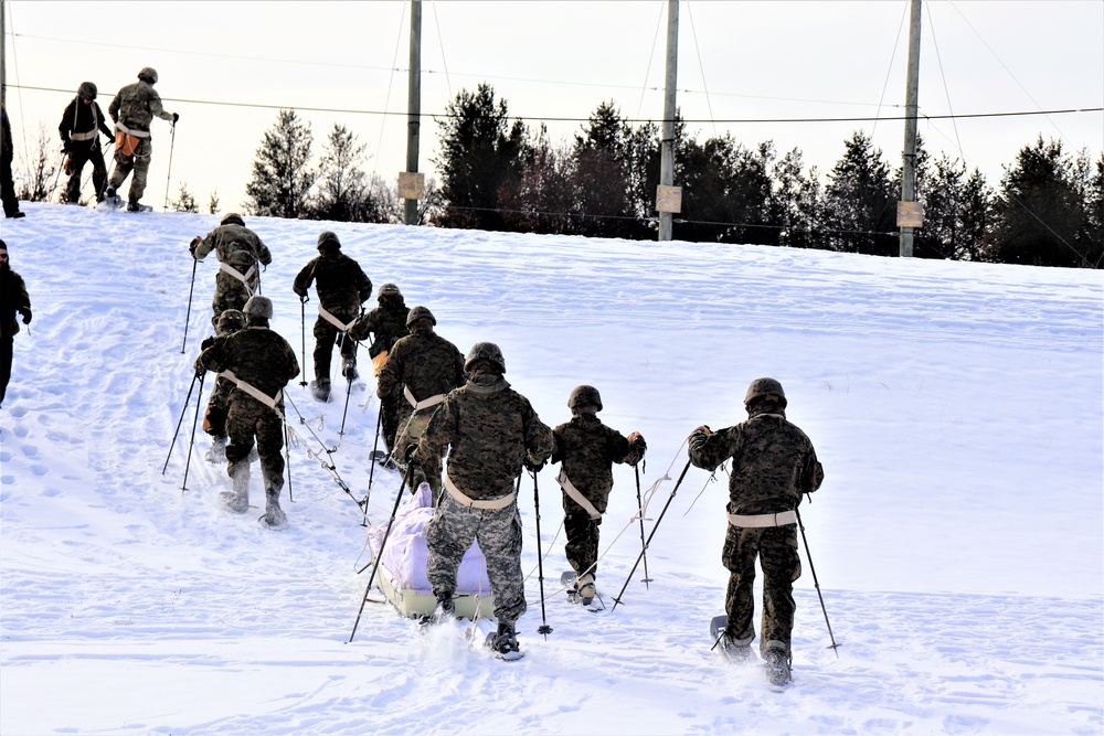 Fort McCoy CWOC class 21-03 students train using snowshoes, ahkio sleds