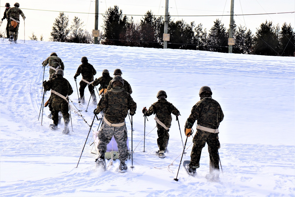 Fort McCoy CWOC class 21-03 students train using snowshoes, ahkio sleds