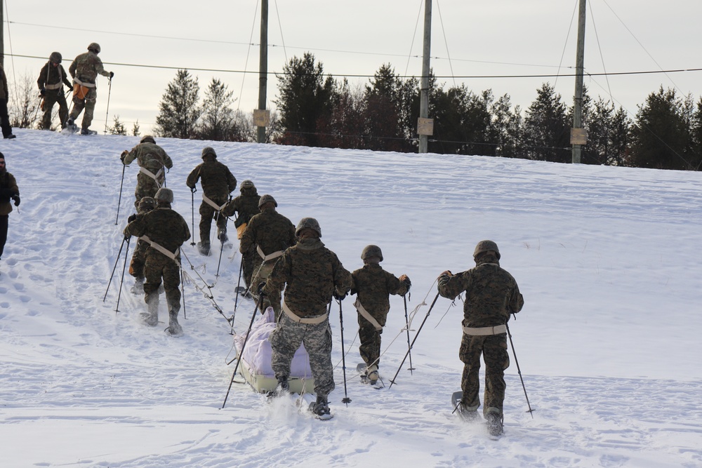 Fort McCoy CWOC class 21-03 students train using snowshoes, ahkio sleds