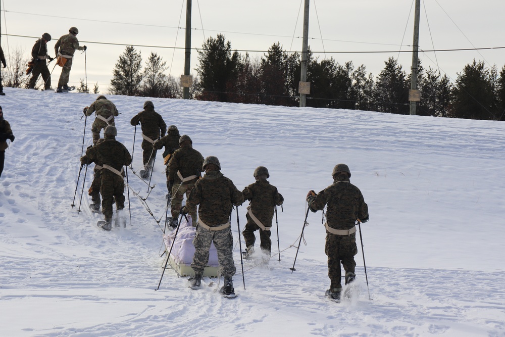 Fort McCoy CWOC class 21-03 students train using snowshoes, ahkio sleds