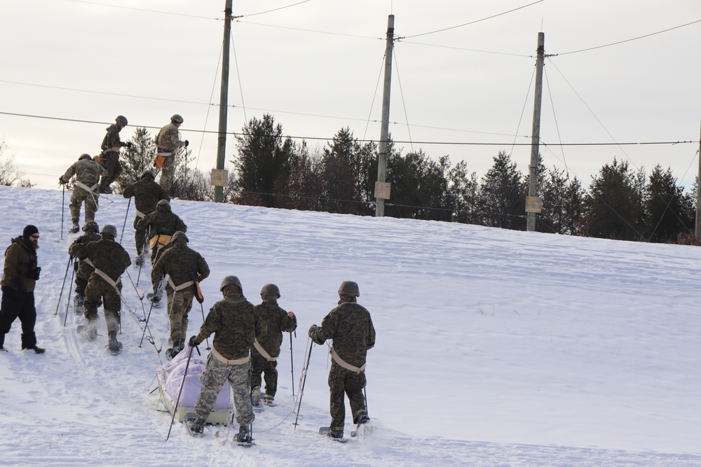 Fort McCoy CWOC class 21-03 students train using snowshoes, ahkio sleds