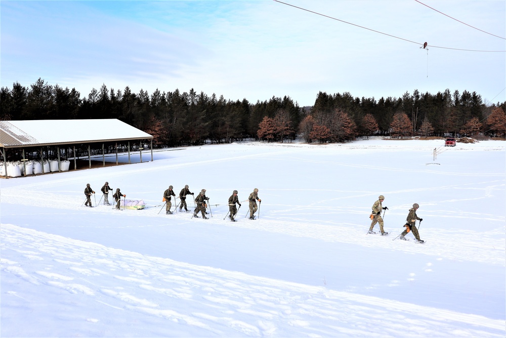 Fort McCoy CWOC class 21-03 students train using snowshoes, ahkio sleds