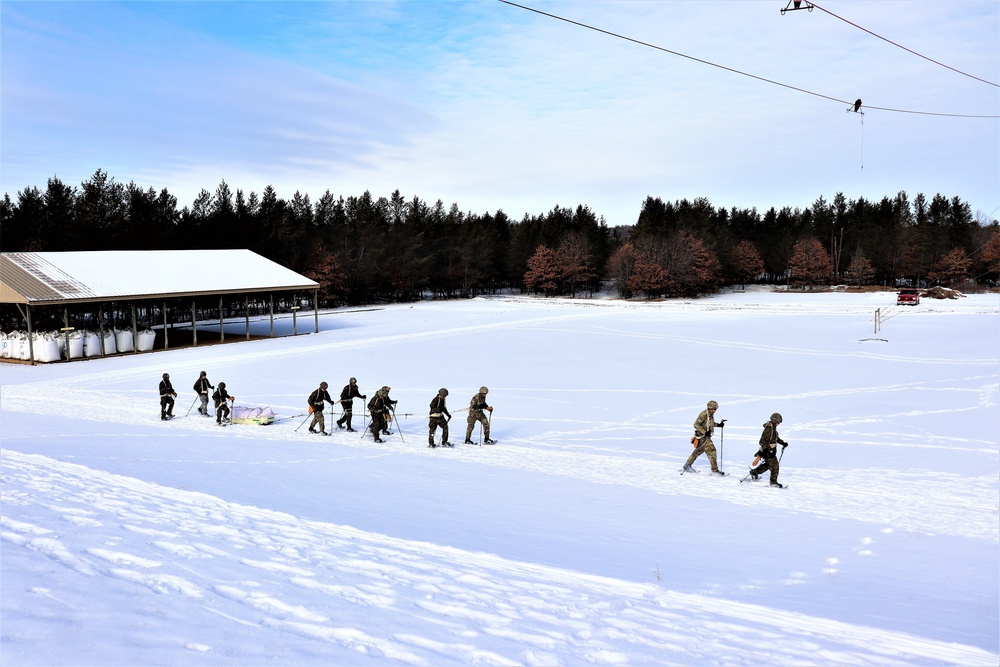 Fort McCoy CWOC class 21-03 students train using snowshoes, ahkio sleds