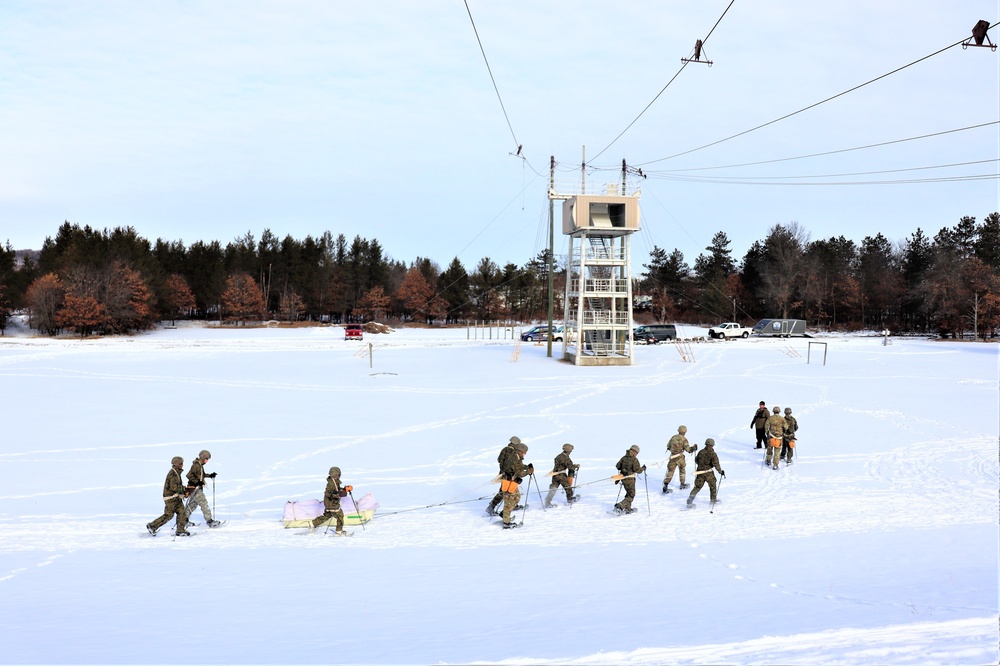 Fort McCoy CWOC class 21-03 students train using snowshoes, ahkio sleds