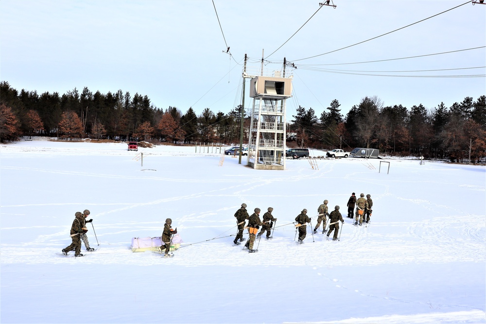 Fort McCoy CWOC class 21-03 students train using snowshoes, ahkio sleds