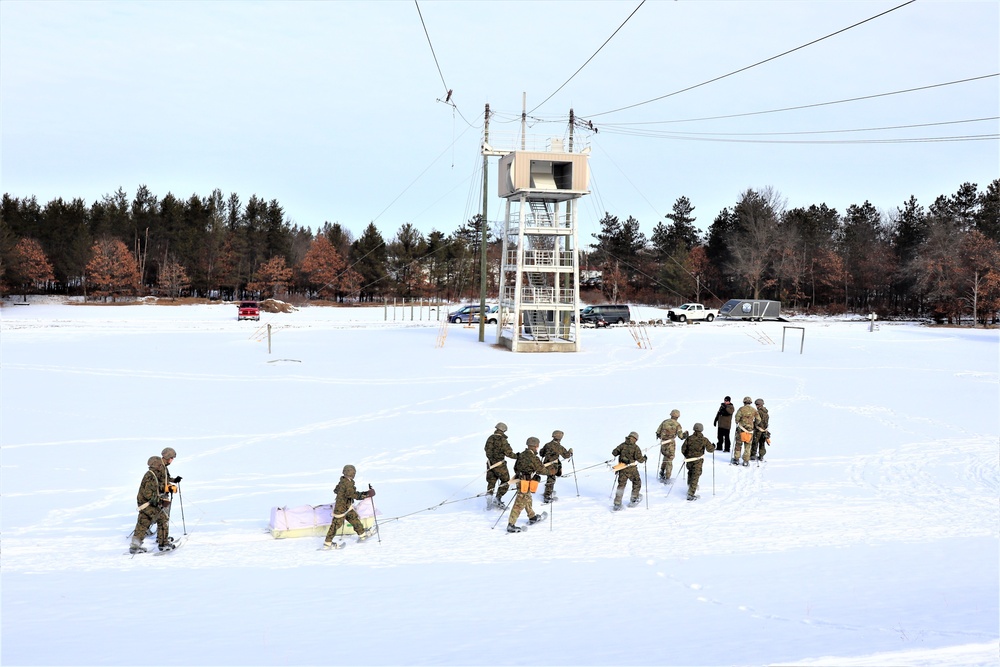 Fort McCoy CWOC class 21-03 students train using snowshoes, ahkio sleds