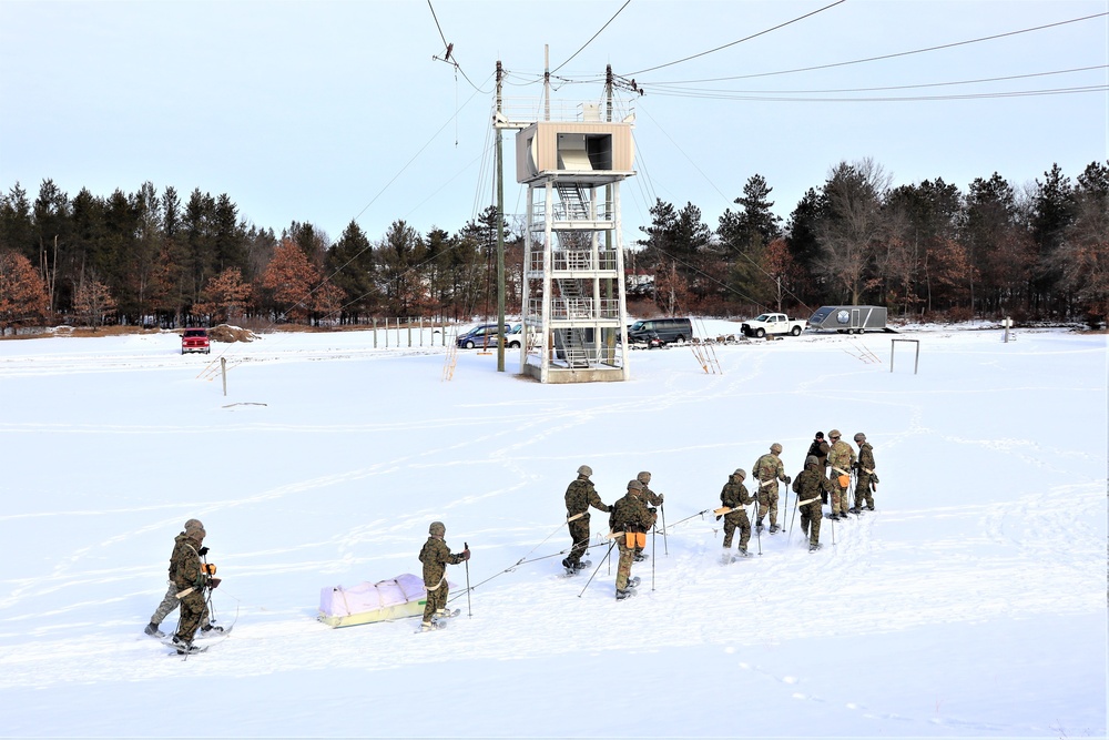 Fort McCoy CWOC class 21-03 students train using snowshoes, ahkio sleds