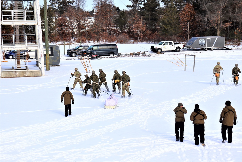 Fort McCoy CWOC class 21-03 students train using snowshoes, ahkio sleds