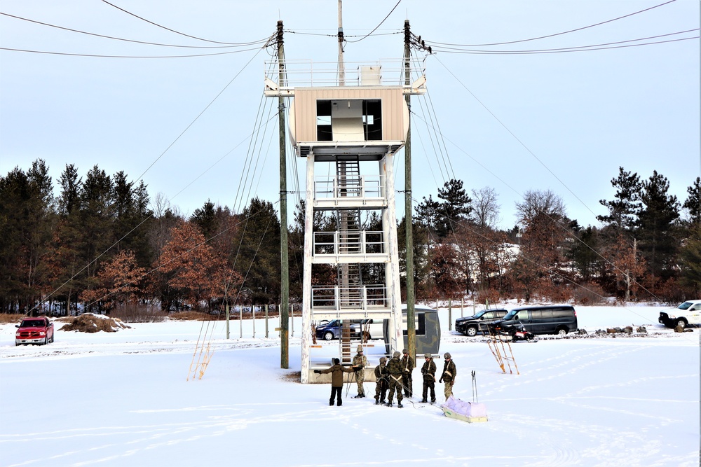 Fort McCoy CWOC class 21-03 students train using snowshoes, ahkio sleds