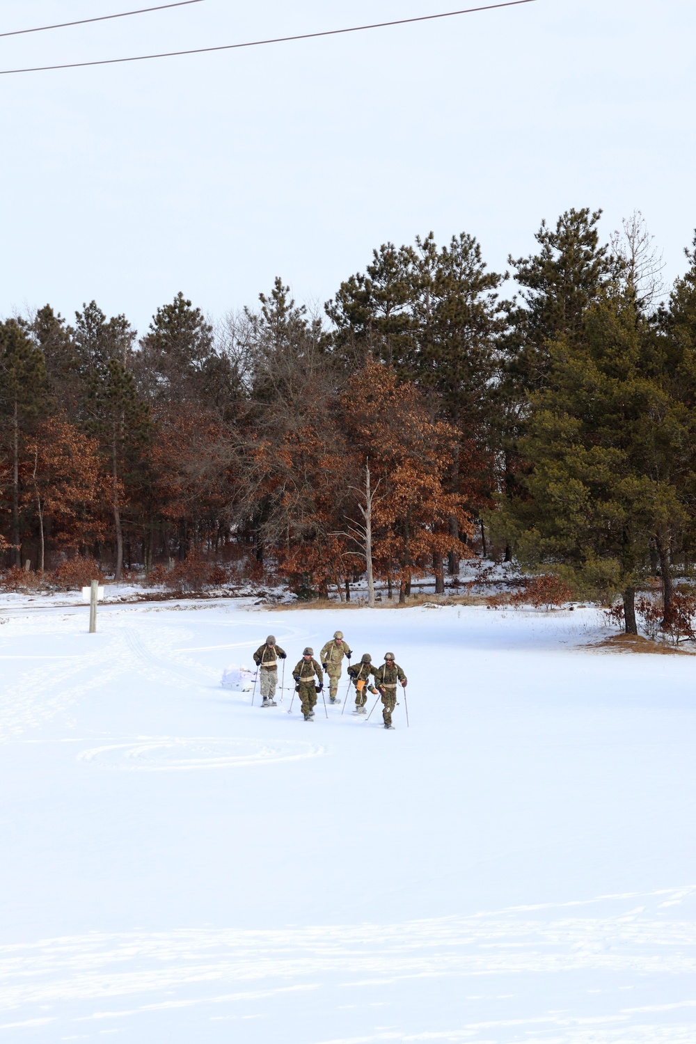 Fort McCoy CWOC class 21-03 students train using snowshoes, ahkio sleds