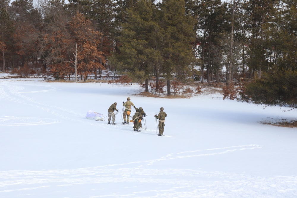 Fort McCoy CWOC class 21-03 students train using snowshoes, ahkio sleds