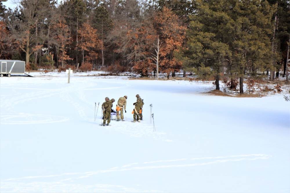 Fort McCoy CWOC class 21-03 students train using snowshoes, ahkio sleds