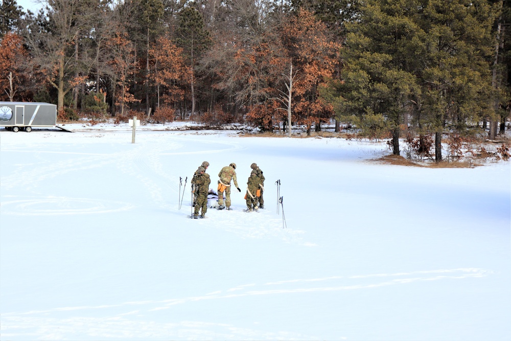 Fort McCoy CWOC class 21-03 students train using snowshoes, ahkio sleds